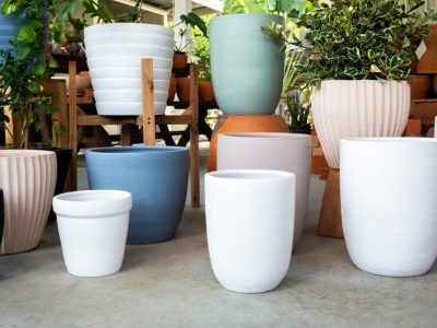 various-colorful-ceramic-plant-pots-arranged-concrete-floor-empty-geometric-ceramic-planter_36367-1329